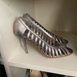 Silver heels. Perfect to dress up or down. Size 6.5